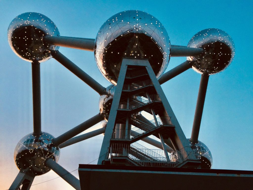 a close up of a building with a lot of balls on it