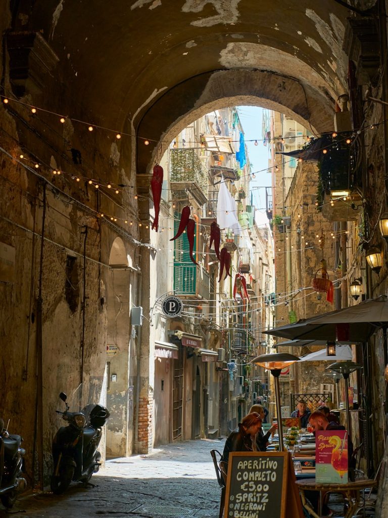 a narrow alleyway with shops