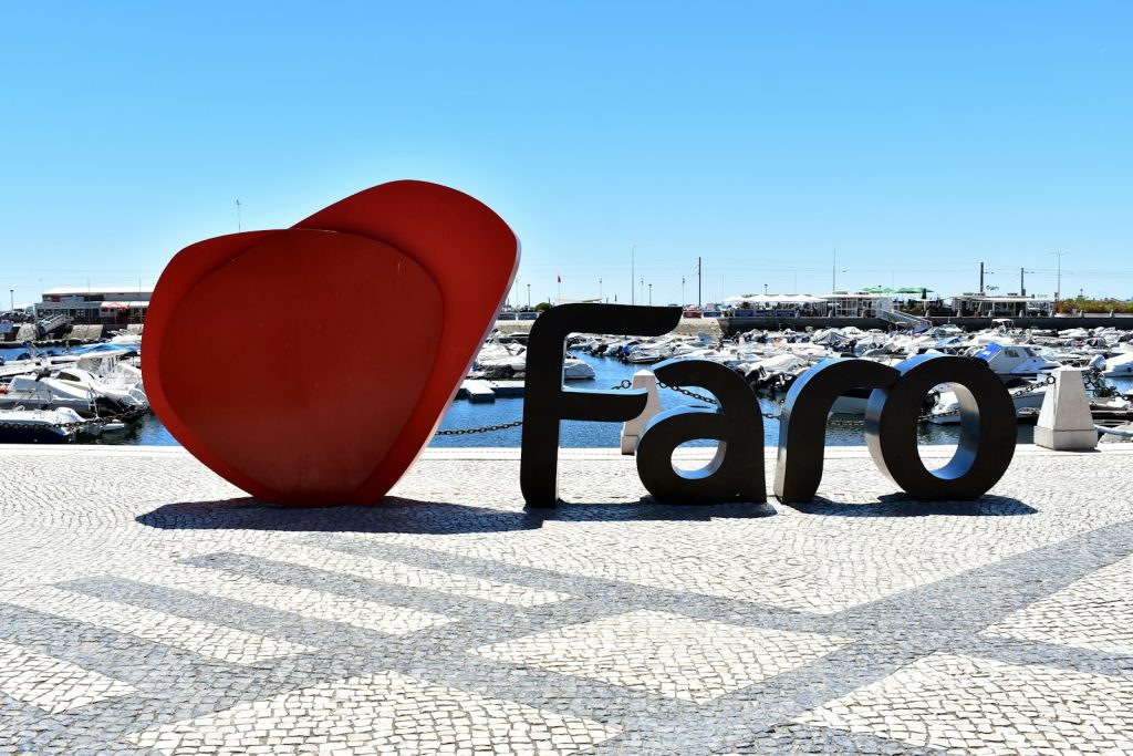 a large red heart sitting next to the word fao